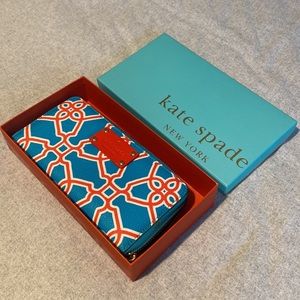 Blue and red Kate spade wallet like new with original packaging